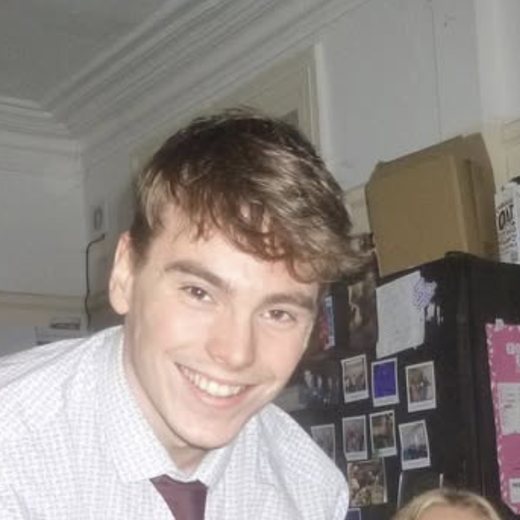 Joe in a shirt and tie